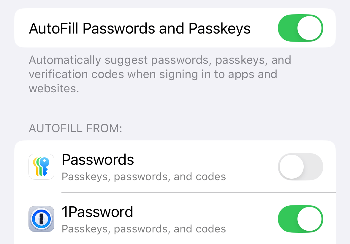 The Password Options page in the Settings app with 1Password turned on and Passwords turned off.